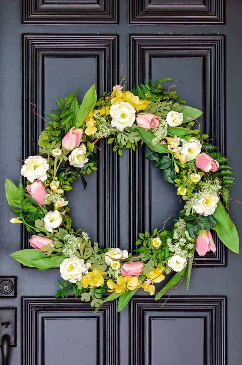 Beautiful spring wreath with pink and yellow flowers