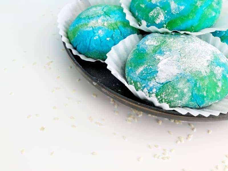 Close up of microwave mochi in green and blue