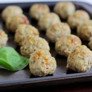 Kid friendly meatballs on a cookie sheet