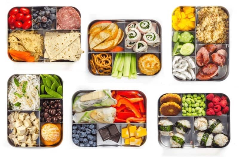 Healthy lunch boxes on a white background