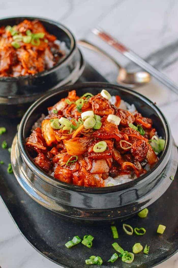Two bowls of spicy Korean pork belly