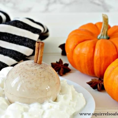 A pumpkin spice latte dessert with pumpkins