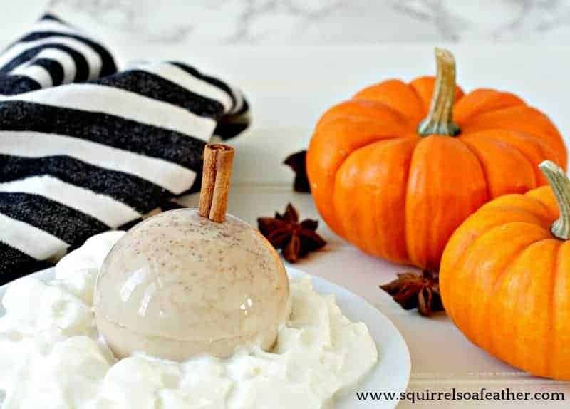 A pumpkin spice latte dessert with pumpkins