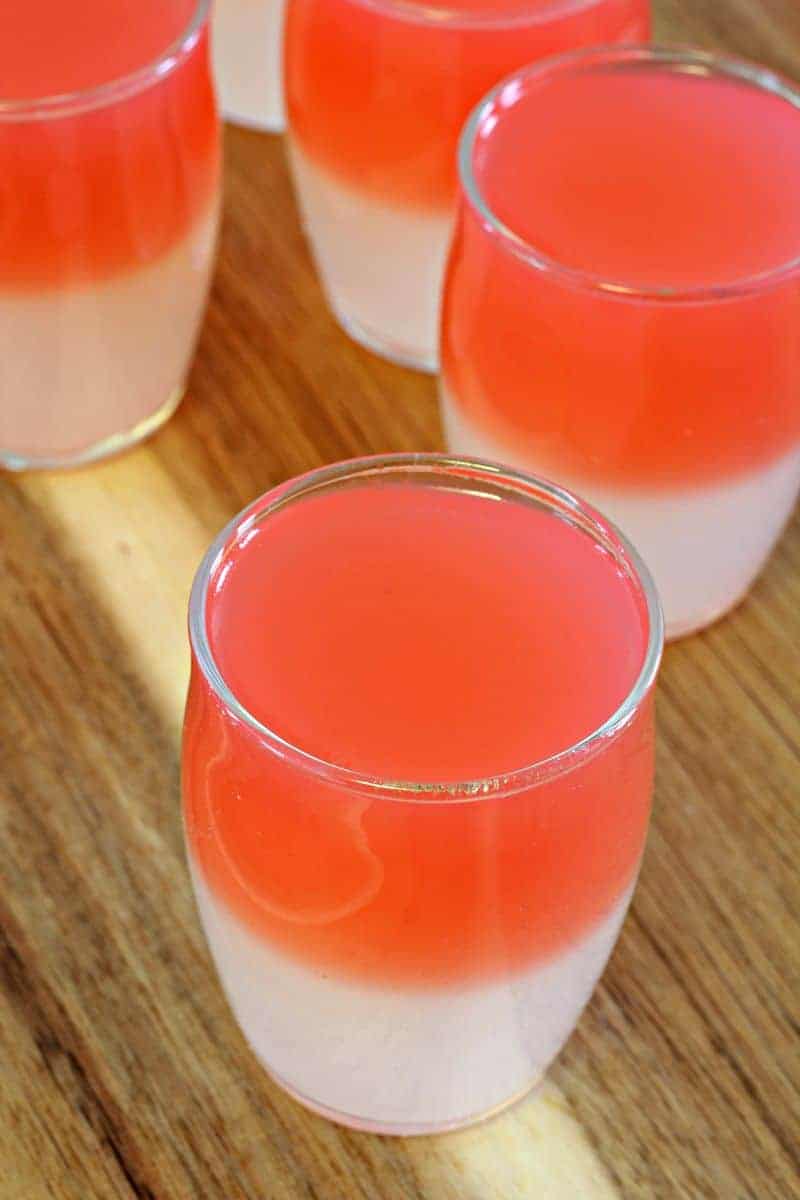 Close up of red rosewater jelly fruit cups