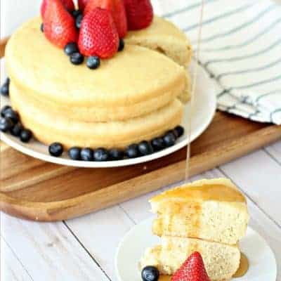 Two giant rice cooker pancakes stacked with fruit