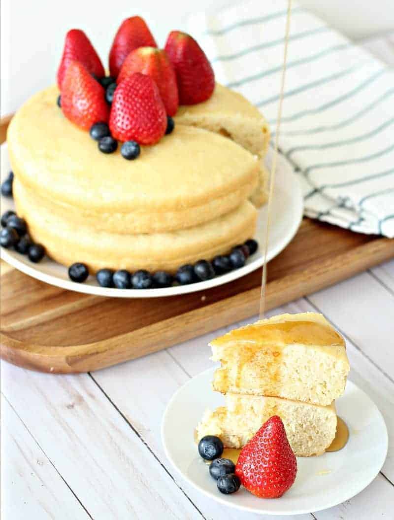 Two giant rice cooker pancakes stacked with fruit