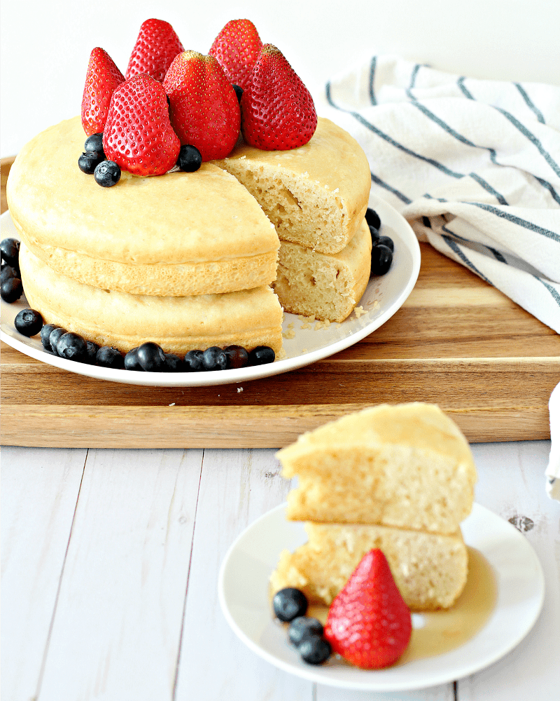 Giant pancakes on a tray with fruit