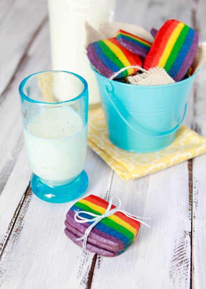 Rainbow St. Patrick's Day cookies with a glass of milk