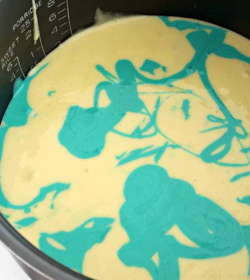 Unicorn cake batter in a cake pan