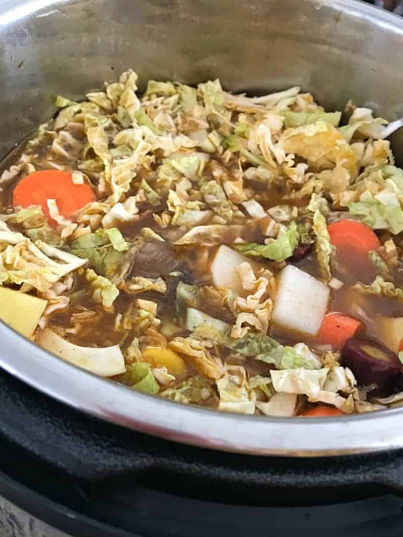 Oxtail soup being cooked in pressure cooker