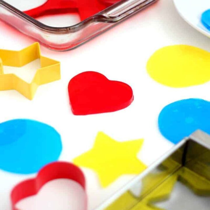 Colorful Jello Jigglers being cut on a table