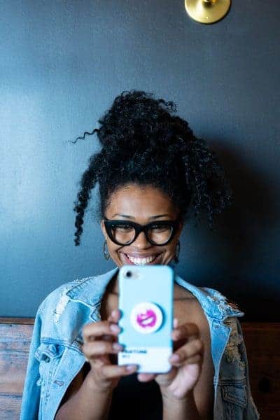 A woman using the eBay app