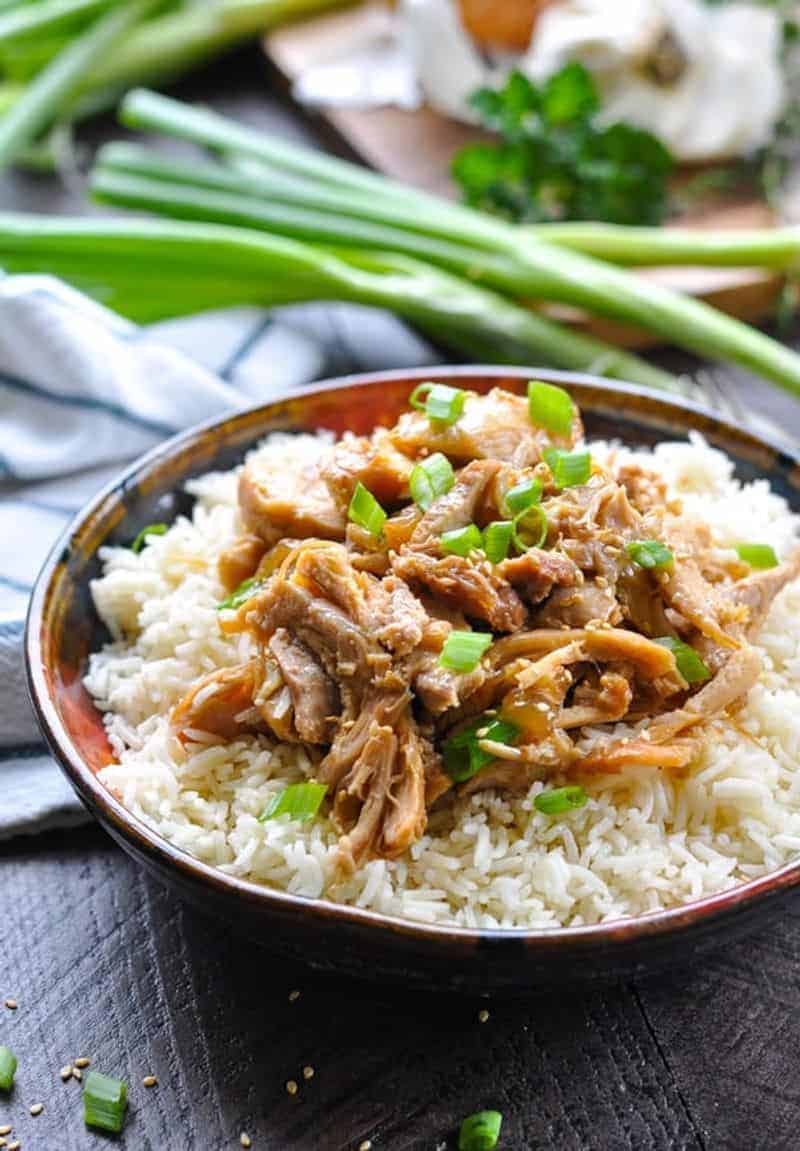 Instant Pot sesame chicken on a bowl with rice