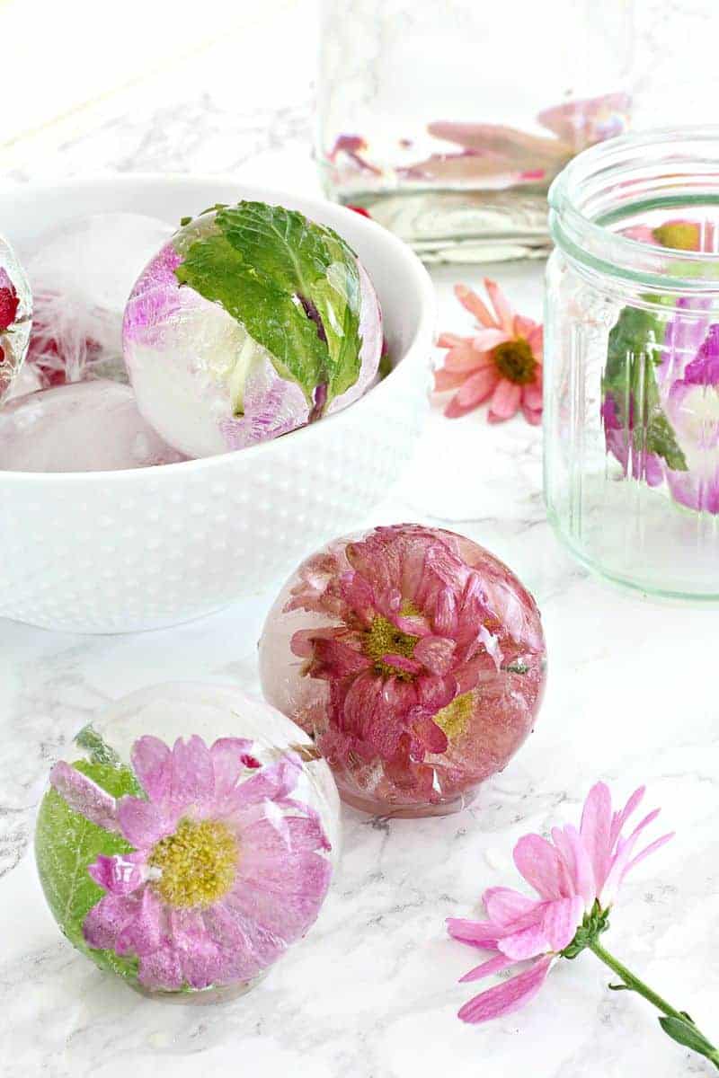 Flowers frozen in ice on a table