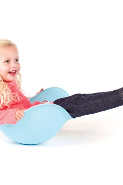 A girl playing with her non-toy Christmas gift