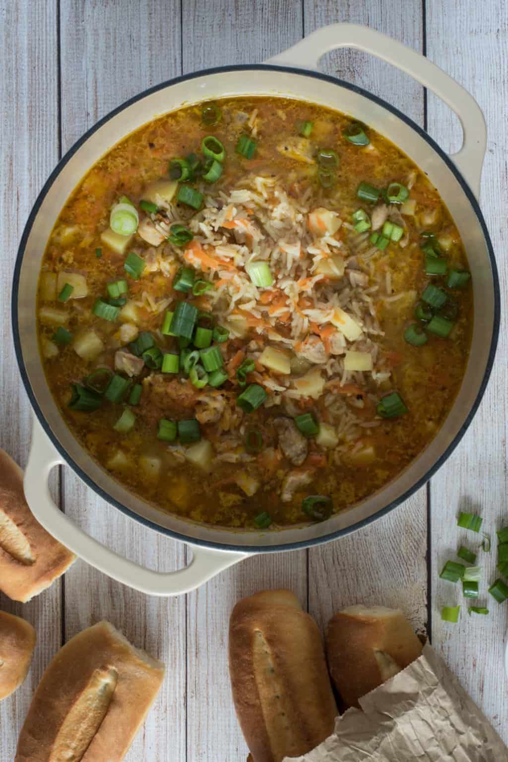 A pot of chicken and rice soup