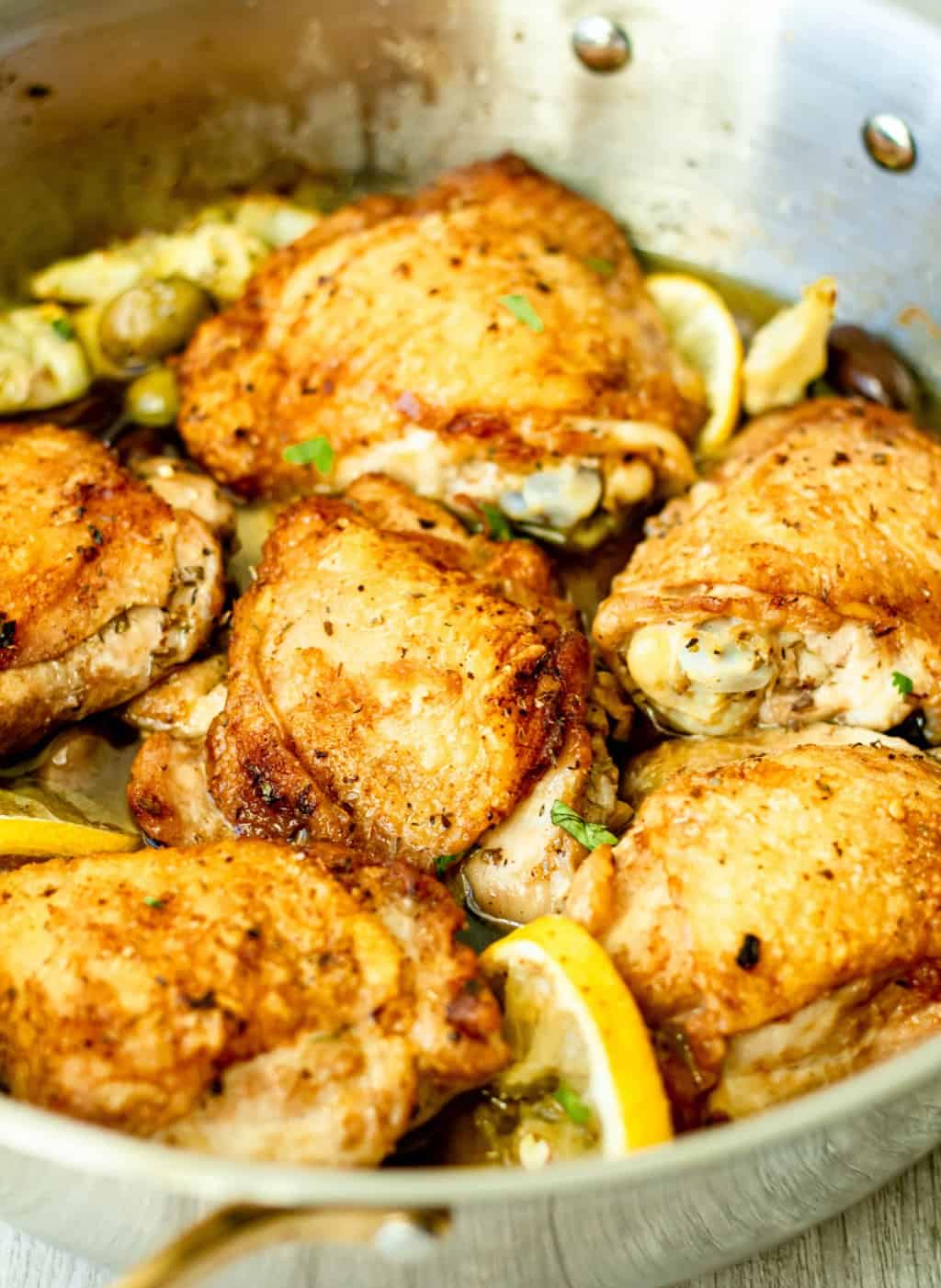 A skillet of one pan chicken thighs