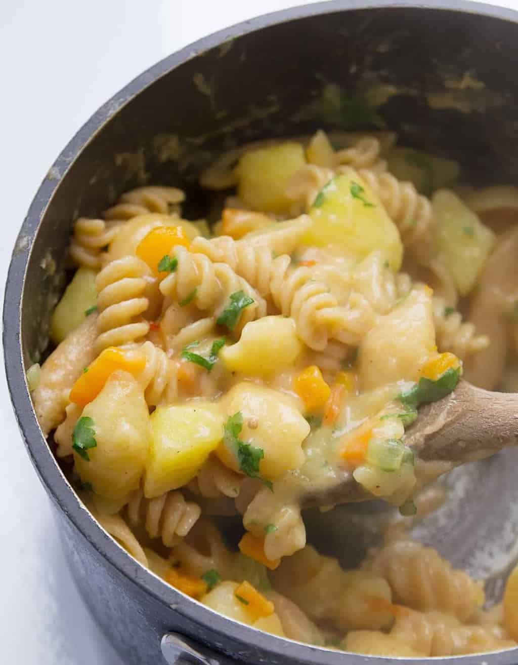 A close up of potatoes and pasta