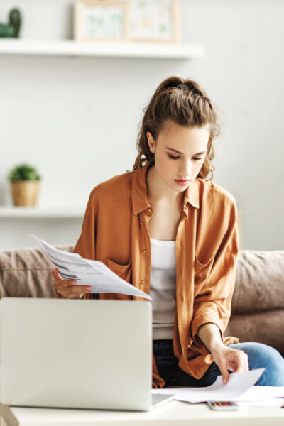 A woman checking her no spend rules